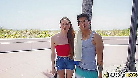 Gorgeous tattooed redhead is spanked by a muscular dude