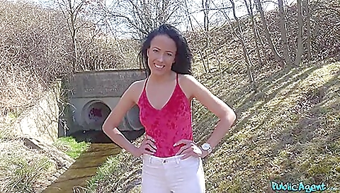 Shaved brunette and her man in the public pool 093