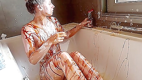 A horny girl does a dirty fuck with herself in a food play