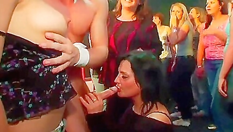 Blonde and brunette getting pounded in a group sex scene