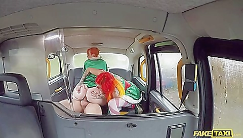 Big ass redhead with tattoos in the taxi is fucked hard
