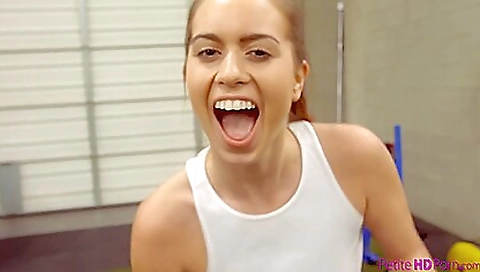 Sexy brunette in a swimsuit gets her legs pulled up