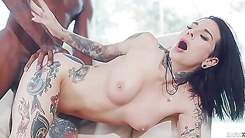 Bright brunette with a tattooed pussy is getting fucked