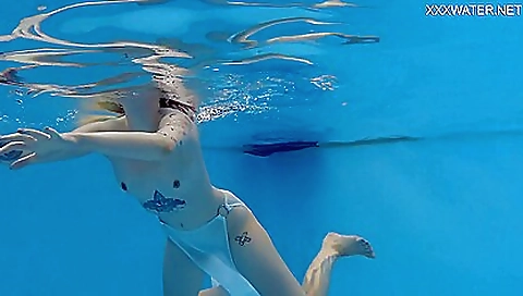 Hot milf enjoying her hotness on a beach and beach towel