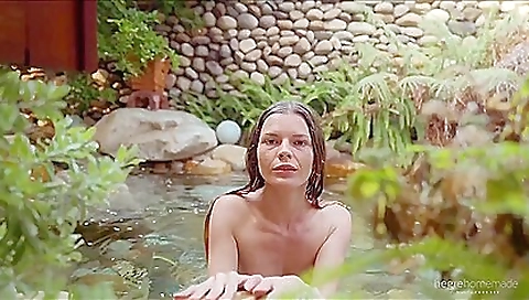 A brunette babe is fucked on the bed and fucked in the doggy position