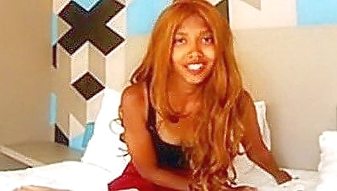 Asian porn video with a busty brunette girl playing with a game