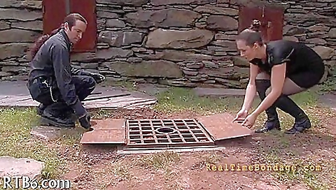 Busty bitch in a white dress is caught with pussy on a pole