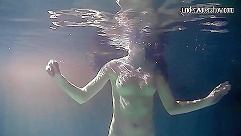 Underwater solo lesbian video with a sexy brunette girl